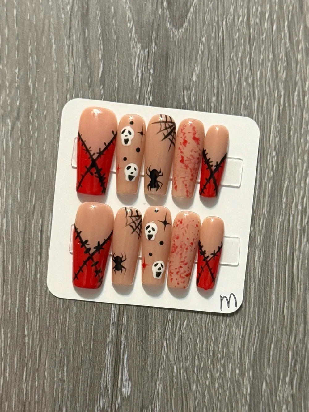 Spooky Stitch Press-On Nails in Nude and Red